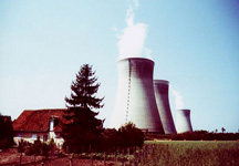 Nuclear plant next to farm agriculture pollution danger power with cooling towers